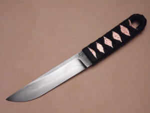 Forged blade — handle material