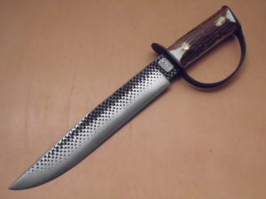 Forged blade — finished and sheathed